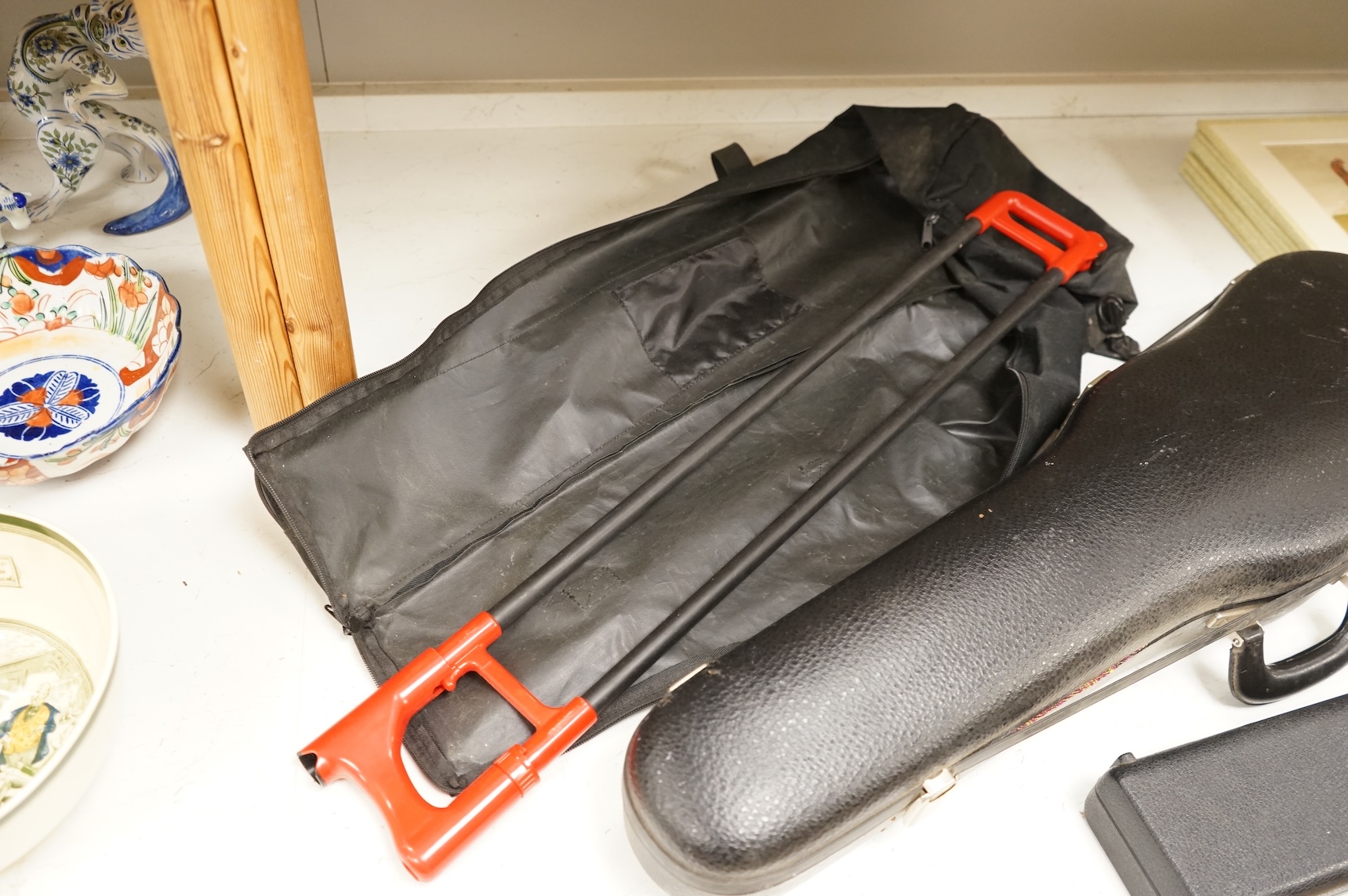 Three musical instruments to include a Buffet flute and violin with two bows